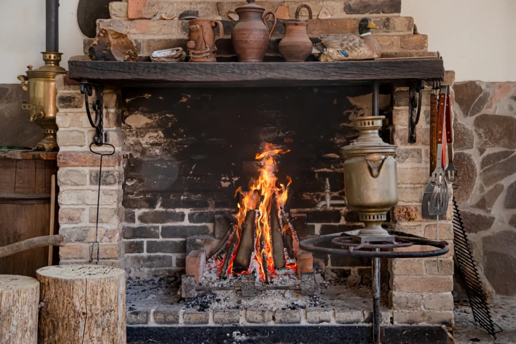 large-fireplace-with-burning-fire-decorative-items